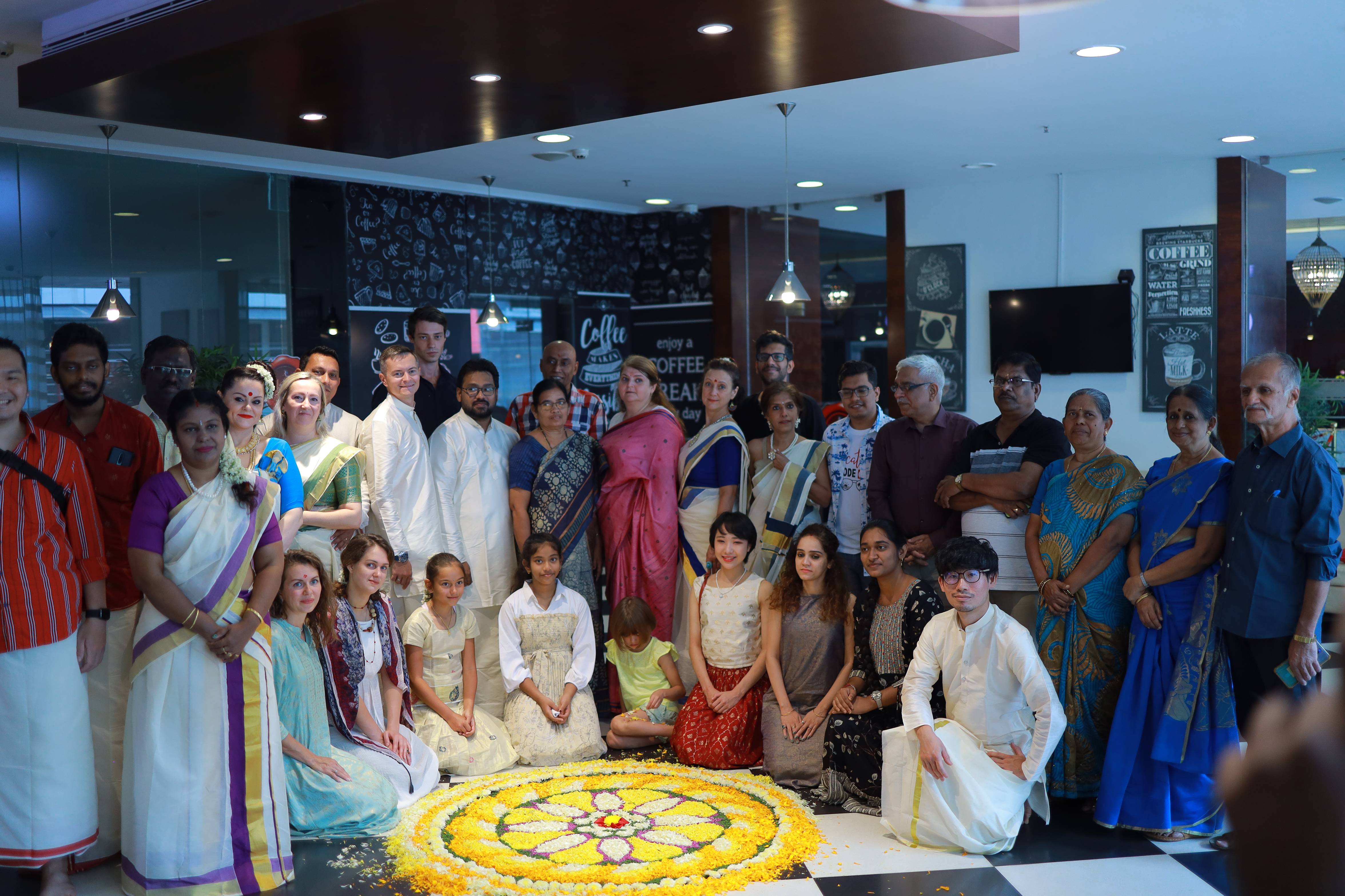 Kerala Tourism Culinary Contest winners enjoy Onam sadya, join flower carpet